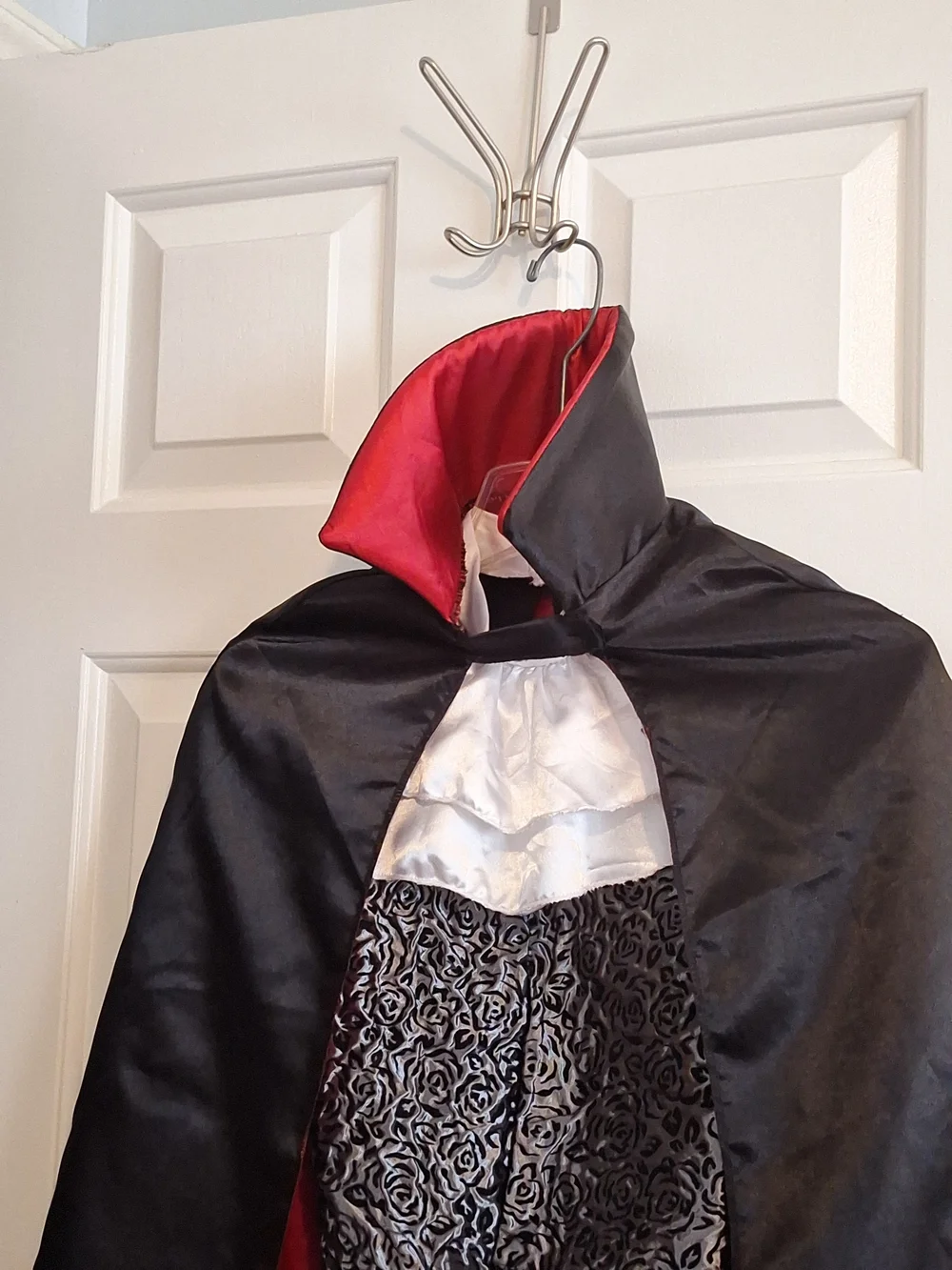 Spirit Black Cape with Red Satin Lining and Silver-Patterned Front